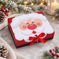 Presentbox med jultomte och röd rosett