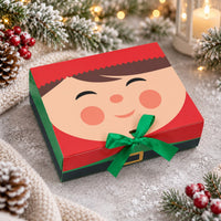 Presentbox med tomtenisse och grön rosett